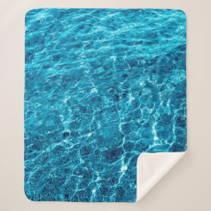 Cobertor Sherpa Foto de uma macro borbulhando água do mar azul cl