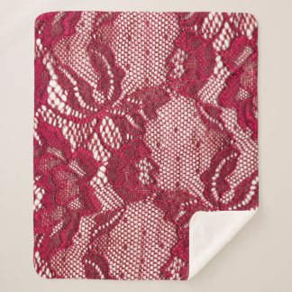 Cobertor Sherpa Lace vermelho: têxtil de gaquard elástica.