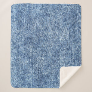 Cobertor Sherpa Lave com ácido o denim azul, textura próxima.