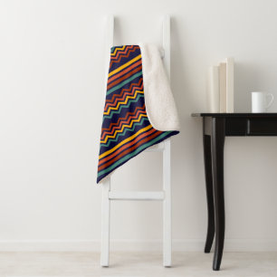 Cobertor Sherpa Listras de Chevron Boho dos anos 70 em Azul Marinh