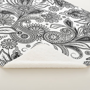 Cobertor sherpa preto e branco com desenho paisley