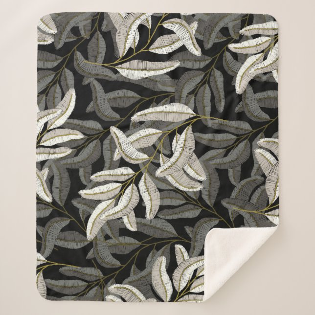 Cobertor Sherpa Ramais bordados: impressão preto-branco. (Frente)