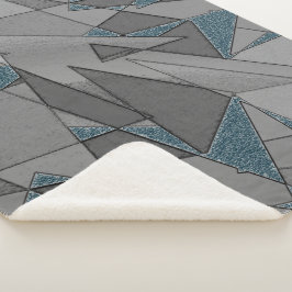 Cobertor Sherpa recortes triangulares de cinza com peças azuis esc