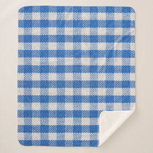 Cobertor Sherpa Roupas de jantar revestidas de cor azul-branca.