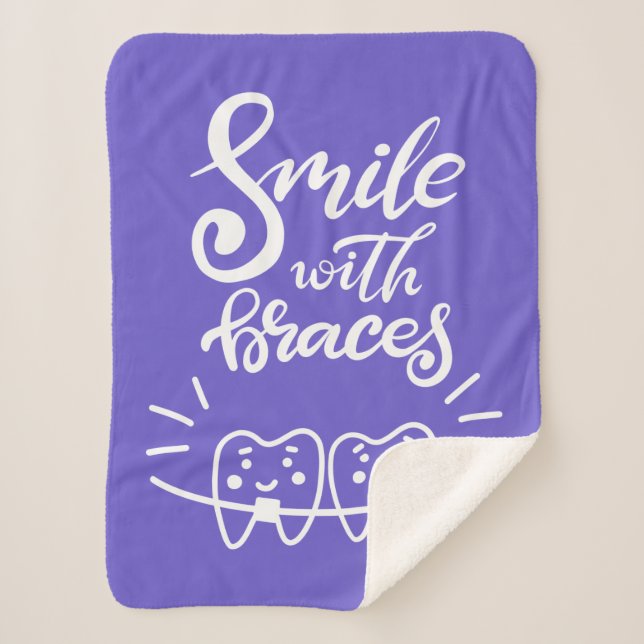 Cobertor Sherpa Sorriso com os dentes de sorriso das cintas | (Frente)