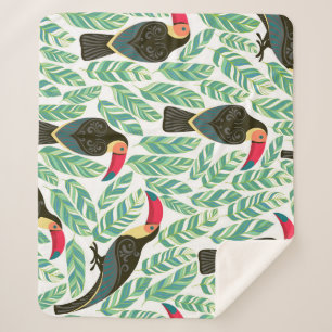 Cobertor Sherpa Tucanos, folhas tropicais, padrão decorativo.