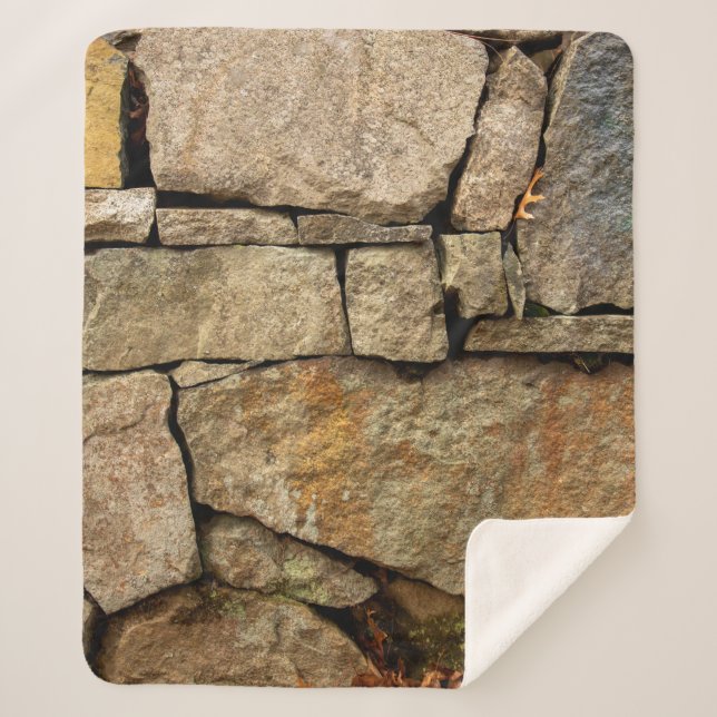 Cobertor Sherpa Um muro de pedra feito de paralelepípedos textu de (Frente)