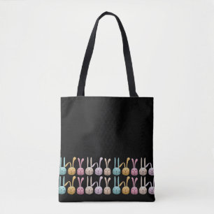 Coelhinhos em uma bolsa de tote