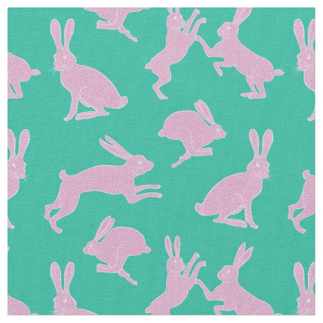 Coelhos cor-de-rosa bonitos no tecido verde do (Detalhe)