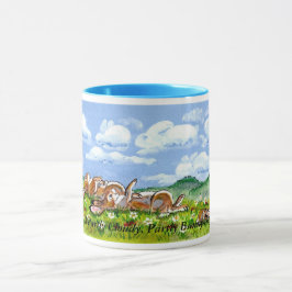 Coelhos de coelho deliciosos que olham a caneca