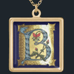 COLAR BANHADO A OURO LETRA B AZUL DOURADA COM MONOGRAMA DE FLORES<br><div class="desc">Letra floral B medieval inicial sobre fundo dourado.</div>