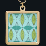 Colar Banhado A Ouro Necklace de Ogee Atômica e Starbursts<br><div class="desc">Nossa! É um Necklace de Ogee Atômico e Starbursts! É uma tomada moderna de um padrão clássico (um meio século moderno, para ser exato). Este design apresenta um fundo aqua com formas ovais verdes e lacrimogêneas sobre linhas pretas verticais de diamantes atômicos e estereótipos. Esse mod traz tudo que foi...</div>