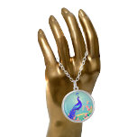 Colar Banhado A Prata Belos Peacock e Rosas<br><div class="desc">pop de azul,  um pássaro eleganteótico maravilhoso,  com flores e fundo azul macio.</div>