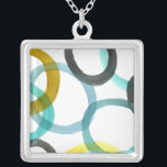 Colar Banhado A Prata Intertravando Círculos Amarelo e Azul<br><div class="desc">Um impressão simples de interligar círculos amarelos e azuis por Megan Meagher. O fundo branco deixa as cores dos círculos pop. Compre o seu hoje!</div>