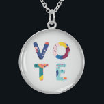 Colar De Prata Esterlina Votar Padrão Floral Moderno Multicolorido Político<br><div class="desc">Saia da votação este ano eleitoral com este lindo e divertido colar! As letras da palavra "vote" são compostas por um padrão floral moderno e abstrato em tons de azul,  verde,  amarelo,  rosa e laranja. Faz um presente maravilhoso para o ativista,  político ou estudante na sua vida.</div>