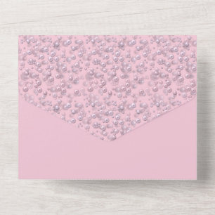 Colocadores de pérolas rosa-branco em veludo rosa