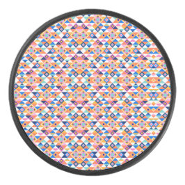 Colorful round speaker with a vibrant geometric 