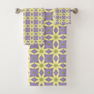 Conjunto De Toalhas Amarelo e roxo com padrão floral geométrico