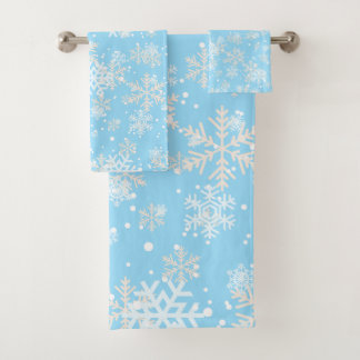 Conjunto De Toalhas Bonito SnowyFlakes contra fundo azul macio