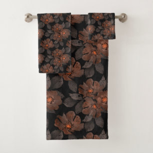 Conjunto De Toalhas Flores cor de laranja e castanhas num fundo preto.