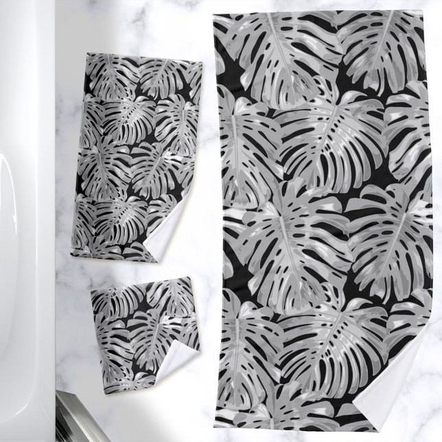 Conjunto De Toalhas Selva Tropical Deixa Cinza preto moderno (Black and gray bath towels with tropical leaves pattern)