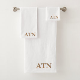 Conjunto De Toalhas Sinais elegantes em fundo branco de cacau