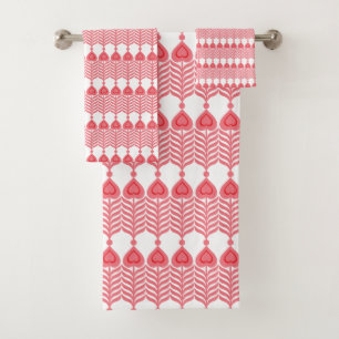 Conjunto De Toalhas Um padrão geométrico vermelho e rosa com interlo