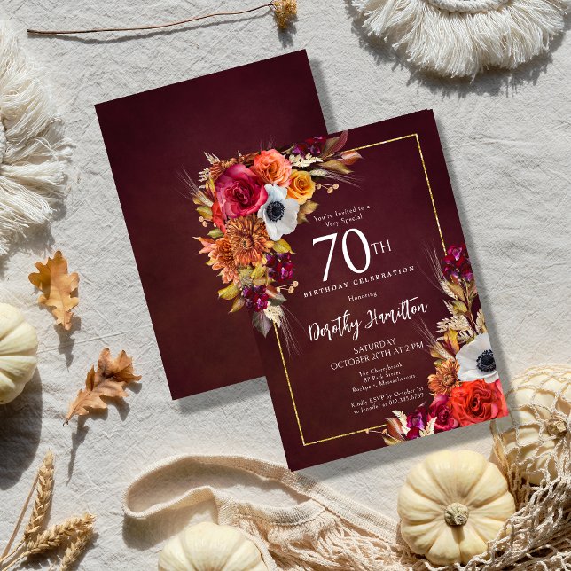 Convite Burgundy Fall Flowers Elegante Script 70 Birthday (Elegant Fall Flowers Pop Against a Burgundy Background on an Autumn Floral 70th Birthday Invitation)