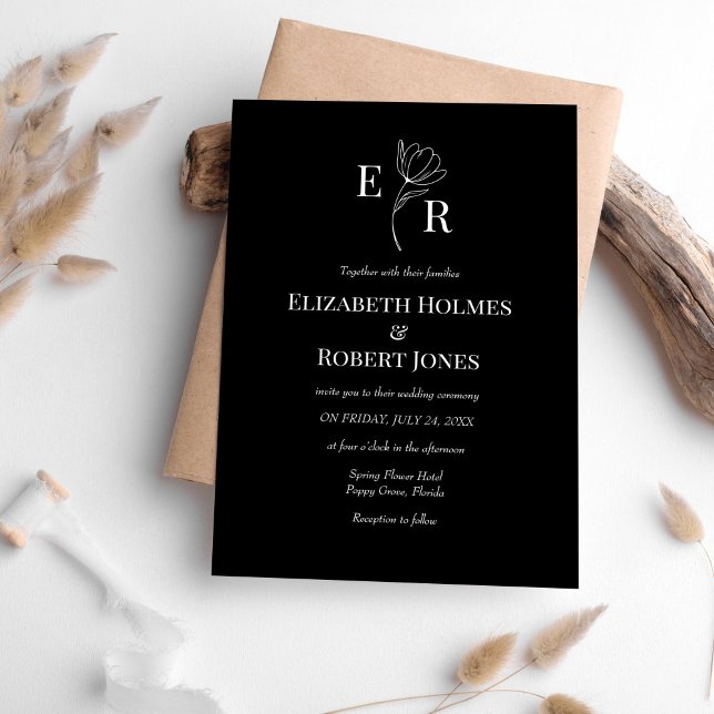 Convite Casamento de Monograma Floral Preto Moderno (Modern Black Floral Monogram Wedding Invitation on white table with neutral boho decoration.)