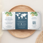Convite Com Dobra Tripla Casamento de Mapa do Mundo Azul com Folhas Tropica<br><div class="desc">Amaze seus convidados com este elegante convite de casamento temático viagem com lindas folhas e tipografia moderna com mapa branco do mundo. Basta adicionar os detalhes do seu evento neste modelo fácil de usar e adorar este cartão com as suas fotografias favoritas para o tornar um convite único.</div>