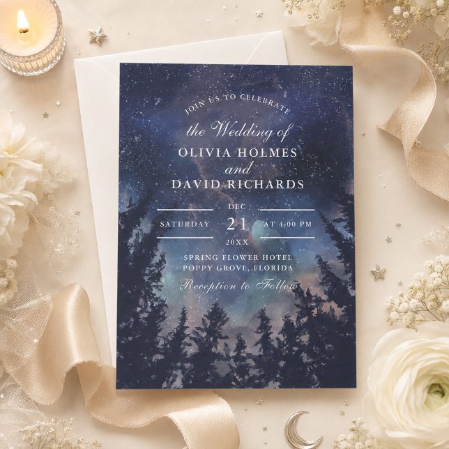 Convite de Casamento Floresta Noturna Estelar Cele (Starry Night Forest Celestial Wedding Invitation on a table with flowers and celestial decor)