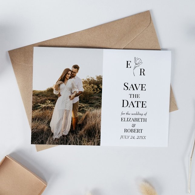 Convite Foto personalizada de monograma floral Salvar o ca (Floral Monogram Custom Photo Save the Date Card on white table with dry wildflowers.)