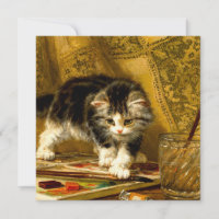 Kitten com pintura e escovas