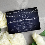 Convite Midnight Garland Rehearsal Dinner Invitation<br><div class="desc">Our elegant rehearsal dinner or cocktail party invitations in chic midnight blue and white feature a richly textured midnight blue background with strings of white lights across the top, and "rehearsal dinner" in chic calligraphy script typography. Personalize with your ceremony rehearsal and rehearsal dinner details beneath. Includes space for the...</div>