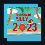 Convite Natal em julho de 2023 Watermelon Beach<br><div class="desc">A ilustração do Natal de julho de 2023,  com o número vermelho do ano 2023,  decorado com corrente luminosa colorida,  melancia fatiada e chapéu vermelho de Papai Noel. Exibido na praia com palmeiras e água oceânica.</div>