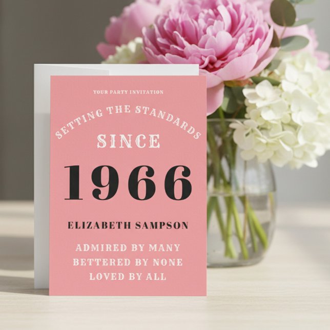 Convite Personalized 60th Birthday 1966 Add Your Name Pink (1966 pink birthday invitation on a table with flowers.)