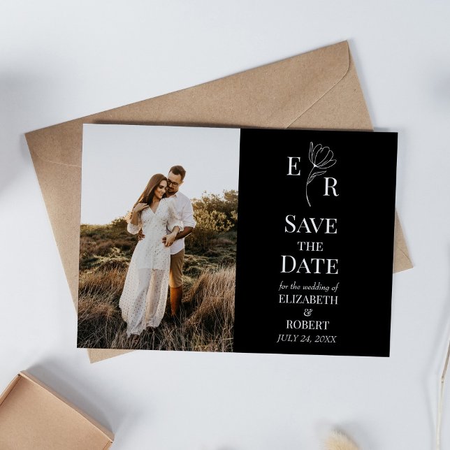 Convite Salvar a Data com Monograma Floral Preto e Foto Pe (Black Floral Monogram Custom Photo Save the Date Invitation on white table with dry wildflowers.)