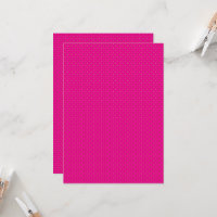 um fundo rosa com bolinhas brancas