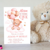 Urso de peluche rosa com balões sobre nuvens