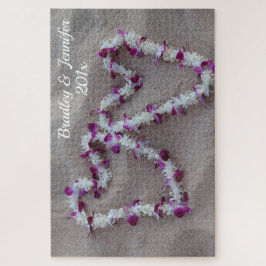 Corações havaianos no quebra-cabeça da areia