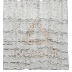 Cortina Para Box Foto de aproximação do logotipo Reebok na parede