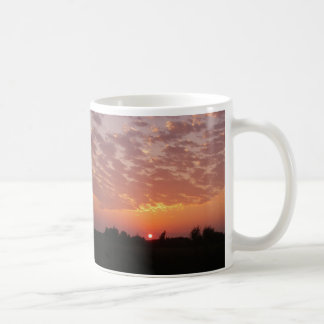 De Café Caneca da beleza do por do sol