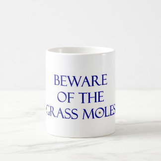 De Café Caneca das toupeiras da grama