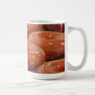 De Café caneca vitrificada das rosquinhas