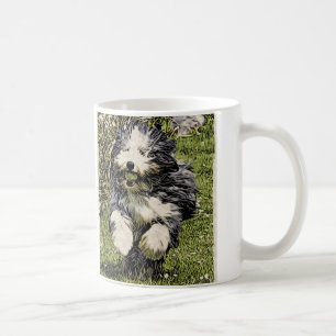 De Café Collie farpado na caneca do funcionamento