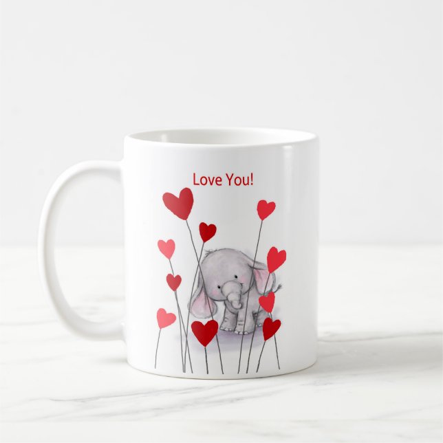 De Café Elefante bonito com a caneca vermelha dos corações (Esquerda)