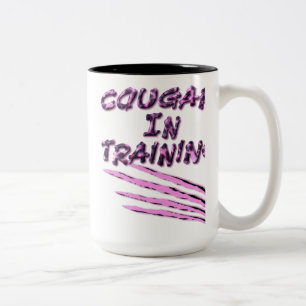 De Café Em Dois Tons O puma na garra do treinamento marca a caneca