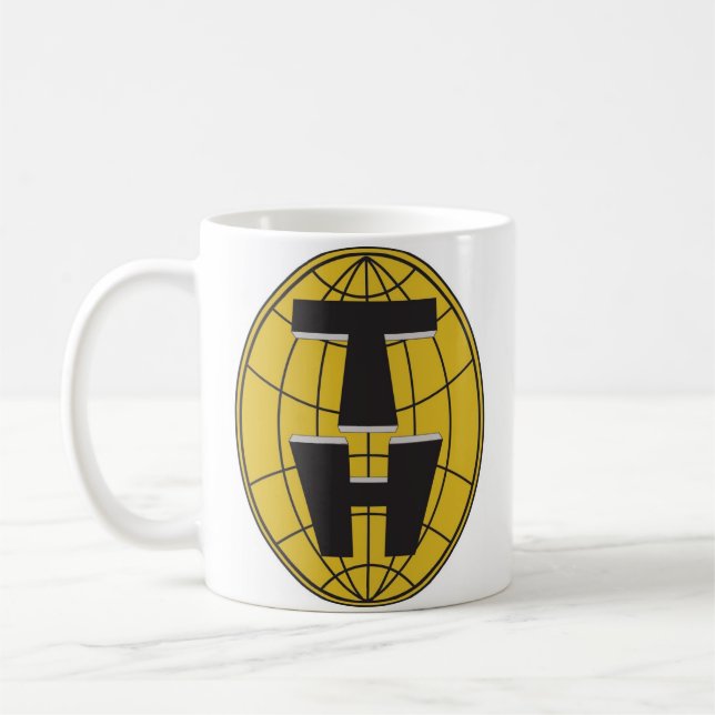 De Café Equipe da caneca do oficial dos heróis (Esquerda)