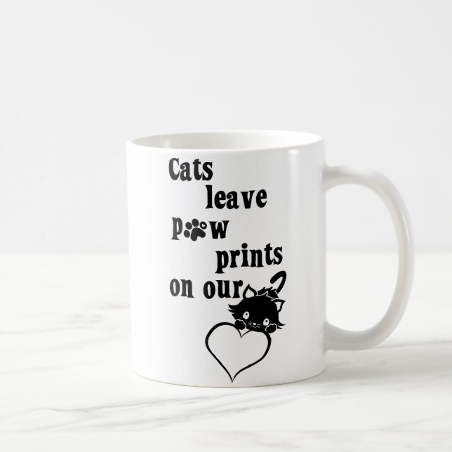 De Café Pawprints da licença dos gatos em nossa caneca dos (Direita)