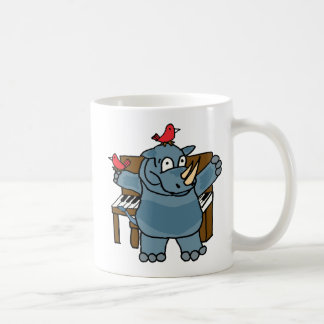 De Café Rinoceronte do CU que joga a caneca do piano